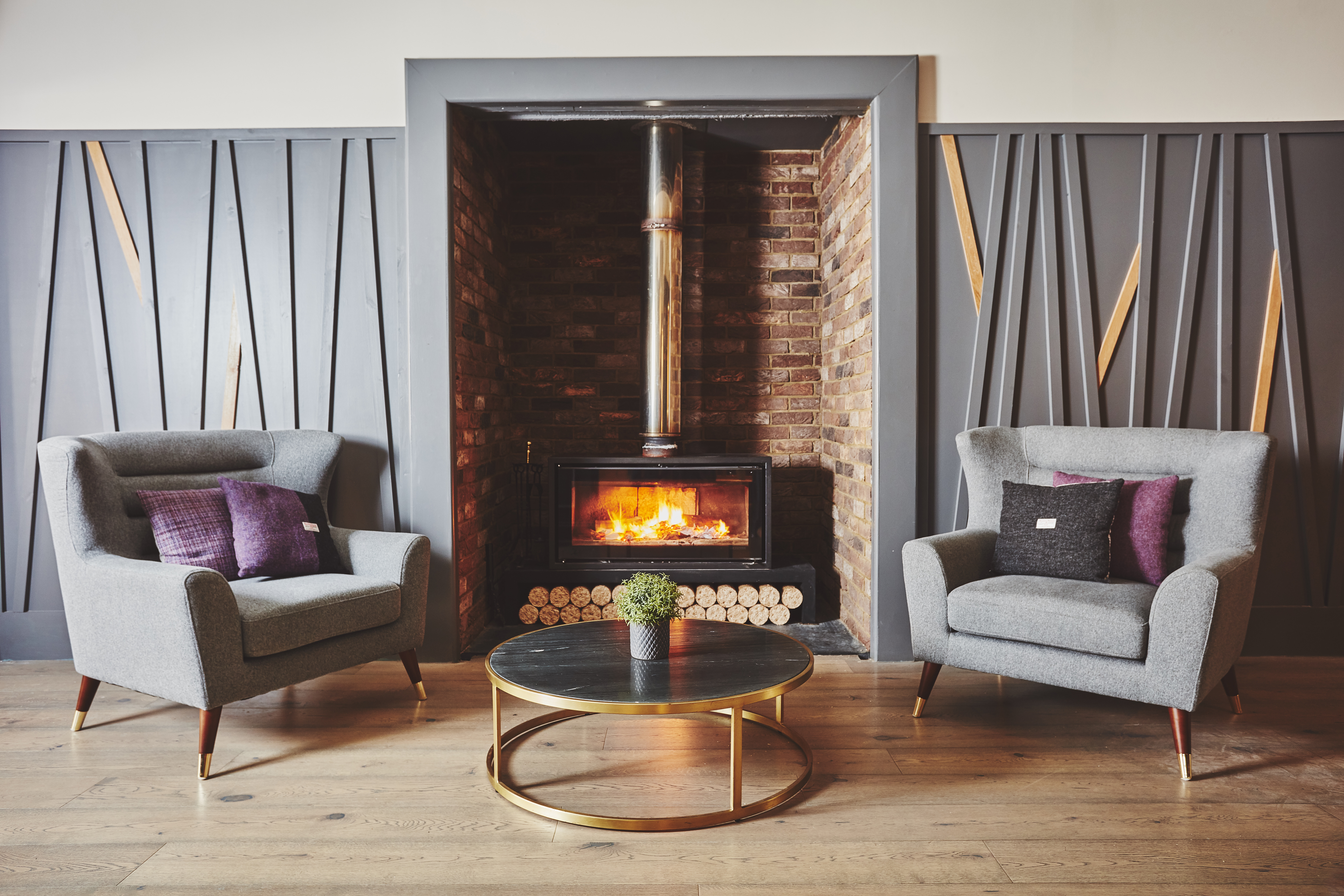 Warm and inviting wood burning stove in the lounge area at The Scot Hotel, Oban